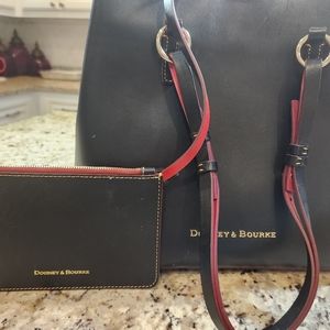 Dooney and Bourke bag. APPROX. 12"wide and 11"tall